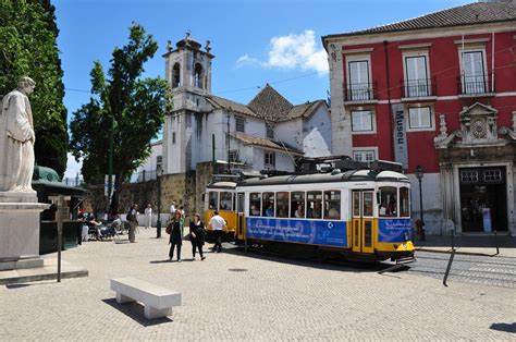 Portugal street with vibrant color buildings and trolley